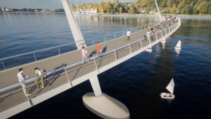 Visualisierung von Schrägseilbrücke über ruhige Warnow mit Fußgängern und kleinen Segelbooten darunter, umgeben von herbstlichen Bäumen